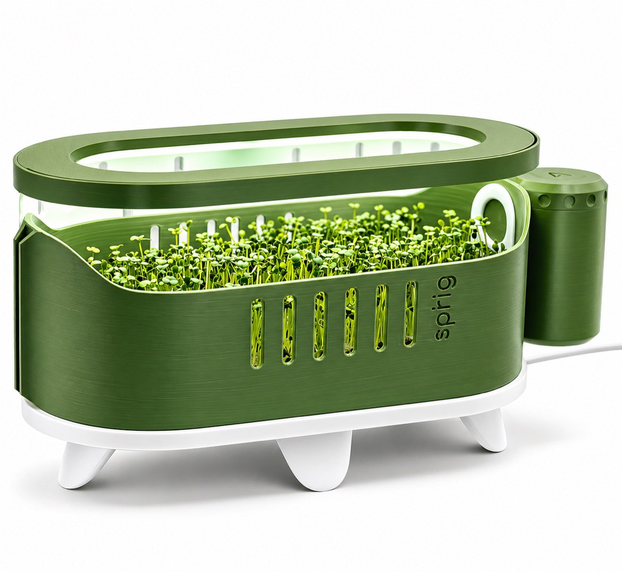 Green Sprig grower with microgreens under a light dock